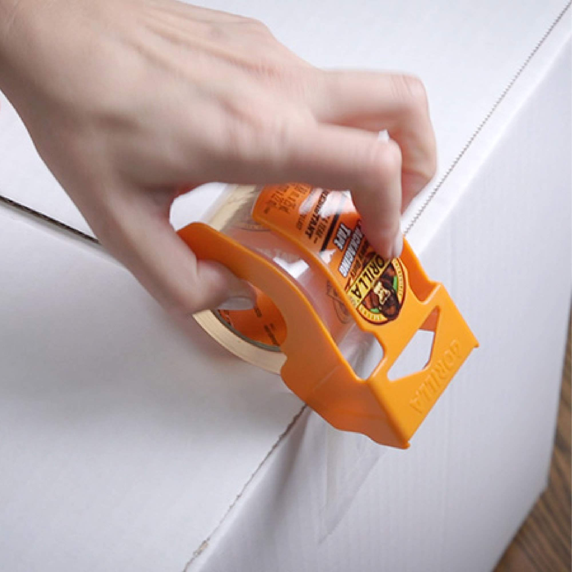 Gorilla Heavy Duty Packing Tape with Dispenser for Moving, Shipping and Storage, 1.88" x 25 yd, Clear, (Pack of 4) - Image 5